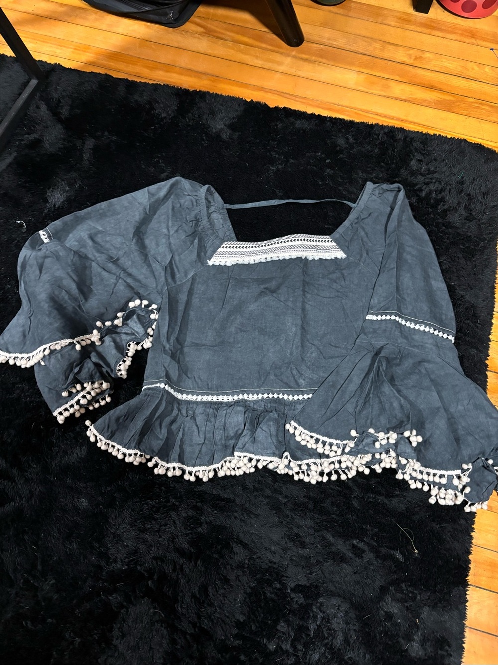 Pom-Trim Peasant Blouse in Charcoal Gray